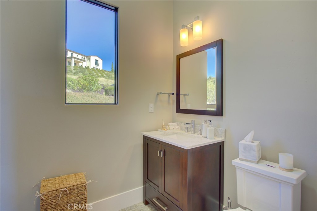 250 Mission Springs Road Arroyo Grande, CA 93420 - Photo 35 of 73 a bathroom with a sink and a mirror