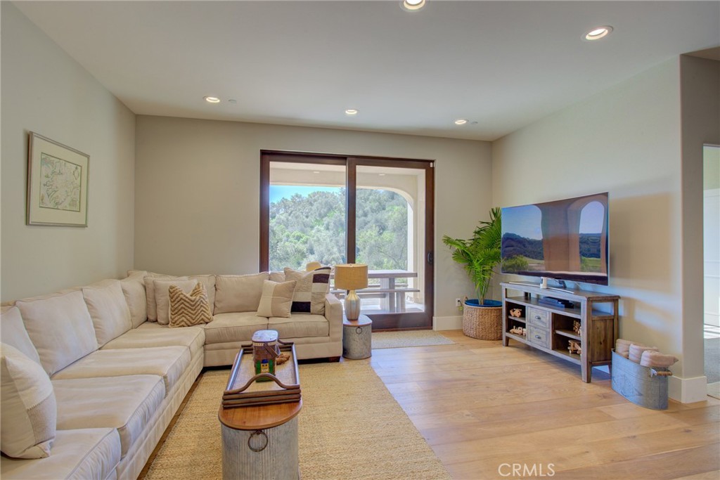 250 Mission Springs Road Arroyo Grande, CA 93420 - Photo 40 of 73 a living room with furniture and a flat screen tv