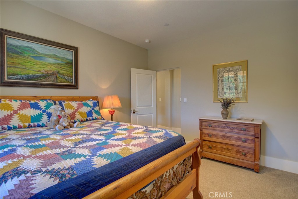 250 Mission Springs Road Arroyo Grande, CA 93420 - Photo 59 of 73 a bedroom with a bed and dresser