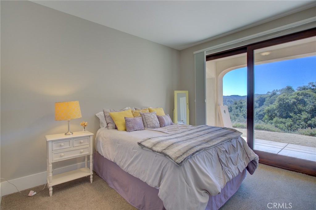 250 Mission Springs Road Arroyo Grande, CA 93420 - Photo 60 of 73 a bedroom with a bed and a window