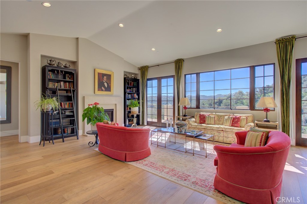 250 Mission Springs Road Arroyo Grande, CA 93420 - Photo 6 of 73 a living room with furniture and a potted plant