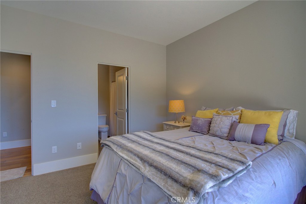 250 Mission Springs Road Arroyo Grande, CA 93420 - Photo 66 of 73 a bedroom with a bed and lamps