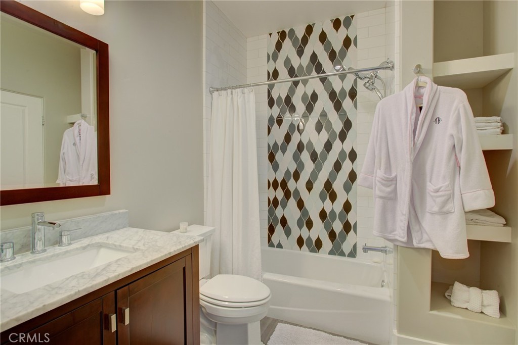 250 Mission Springs Road Arroyo Grande, CA 93420 - Photo 67 of 73 a bathroom with a sink toilet and shower