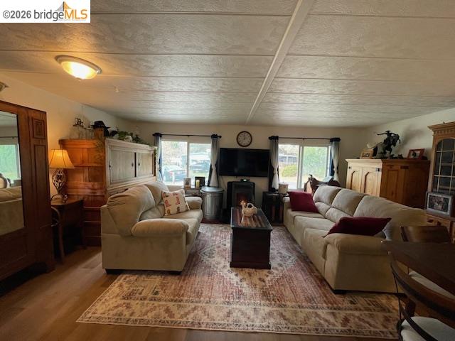 16629 Allison Way, Unit 22 Sonora, CA 95370 - Photo 2 of 30 a living room with furniture and a flat screen tv