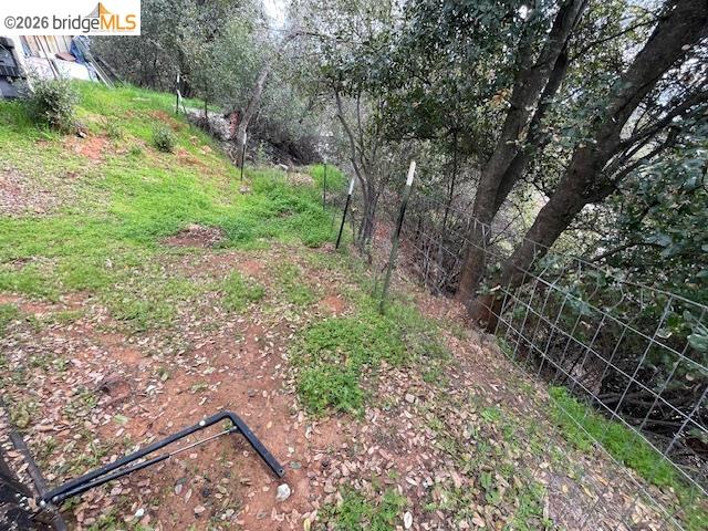 16629 Allison Way, Unit 22 Sonora, CA 95370 - Photo 26 of 30 a view of a yard with plants and large trees