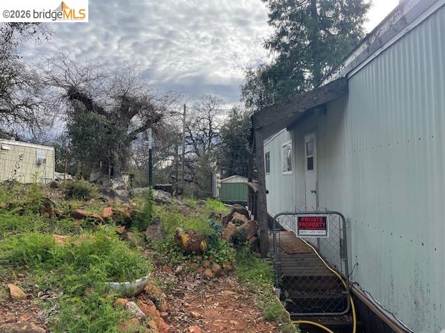 16629 Allison Way, Unit 22 Sonora, CA 95370 - Photo 29 of 30 a backyard of a house with lots of green space
