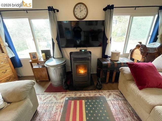 16629 Allison Way, Unit 22 Sonora, CA 95370 - Photo 7 of 30 a living room with furniture a window and a fireplace