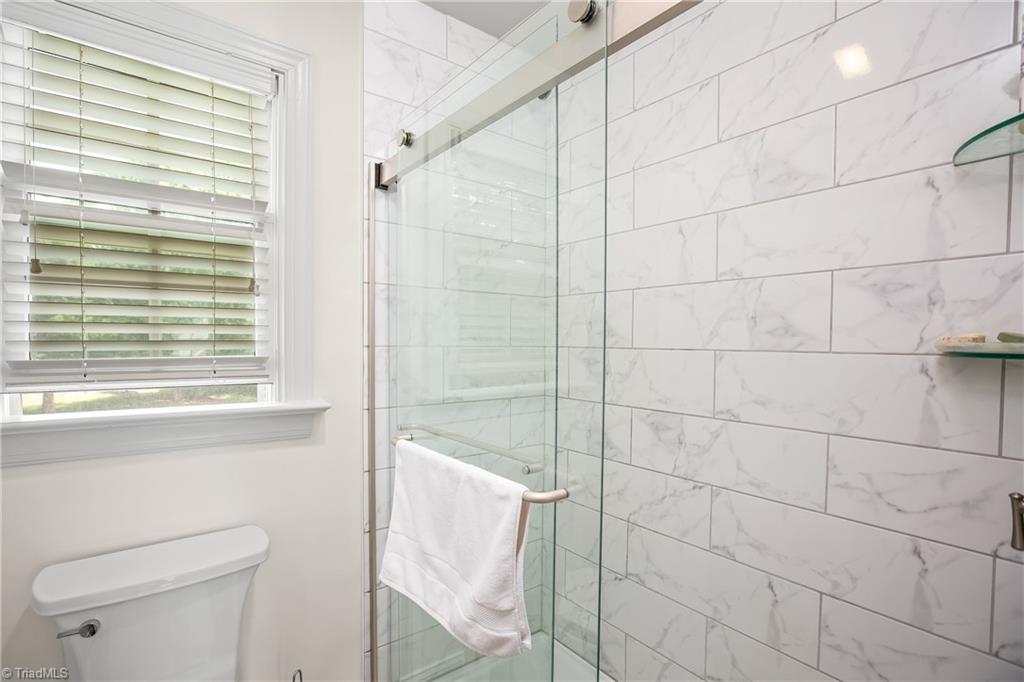 8703 Bromfield Road Oak Ridge, NC 27310 - Photo 27 of 34 Hall/Guest Bathroom.