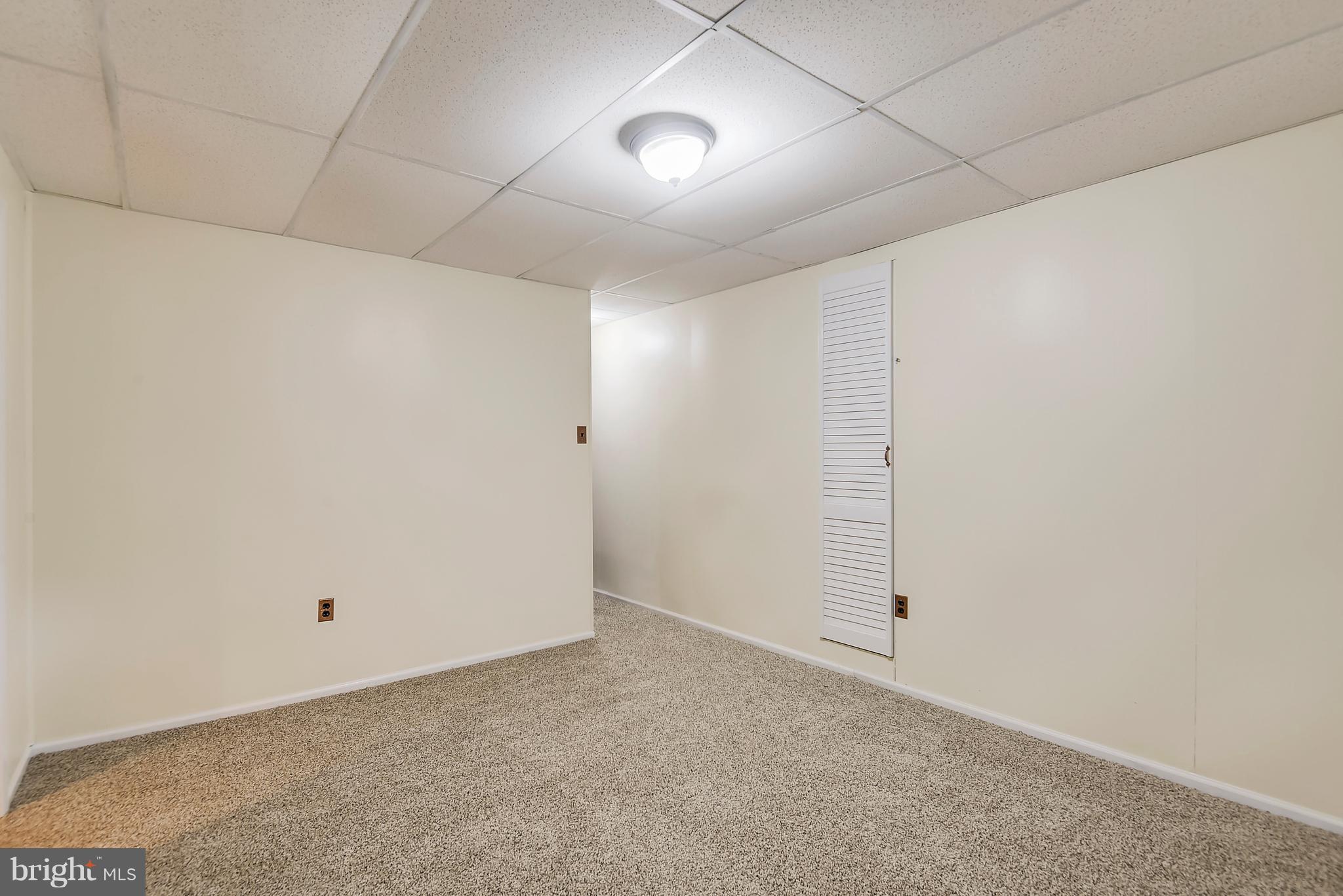 415 Rock Lodge Road Gaithersburg, MD 20877 - Photo 24 of 30 Finished Basement plus ample storage