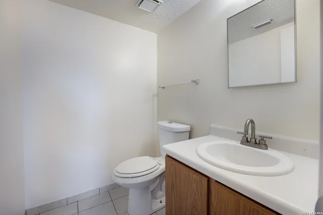 a view of storage and utility room with empty racks