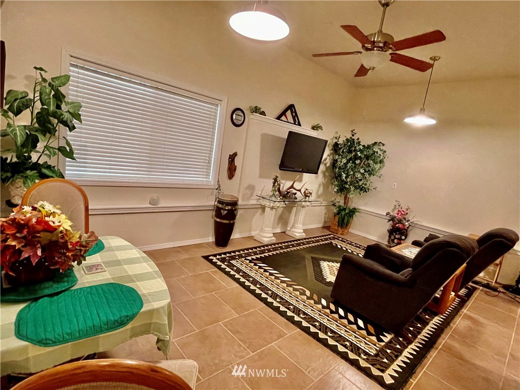 19225 Patterson Road East Orting, WA 98360 - Photo 24 of 34 a living room with furniture and a potted plant