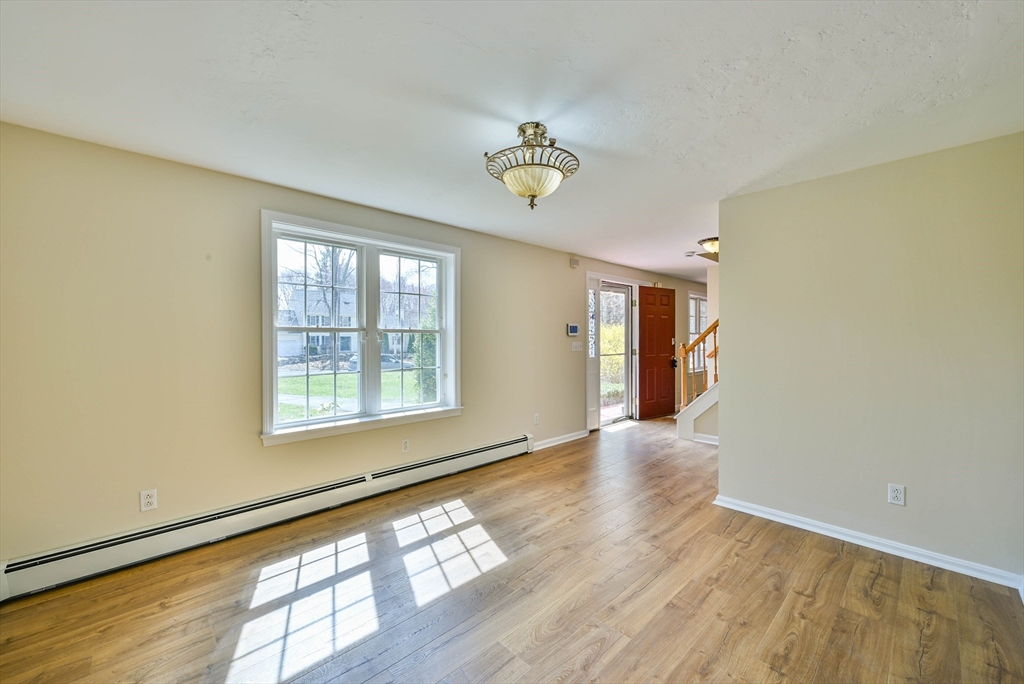 99 Smith Road Charlton, MA 01507 - Photo 13 of 37 a view of an empty room with a window