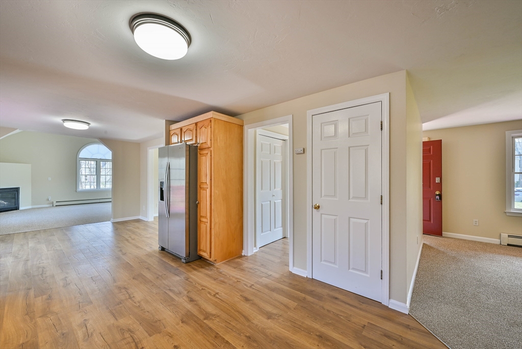 99 Smith Road Charlton, MA 01507 - Photo 17 of 37 a view of a room with wooden floor and windows