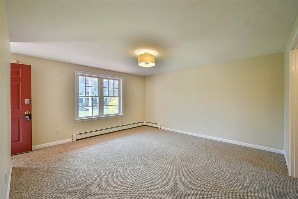 99 Smith Road Charlton, MA 01507 - Photo 24 of 37 an empty room with window and windows