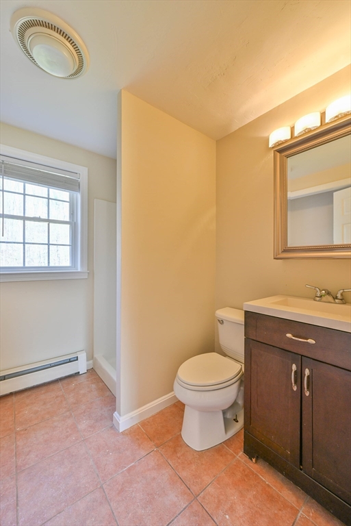 99 Smith Road Charlton, MA 01507 - Photo 27 of 37 a bathroom with a sink toilet and vanity