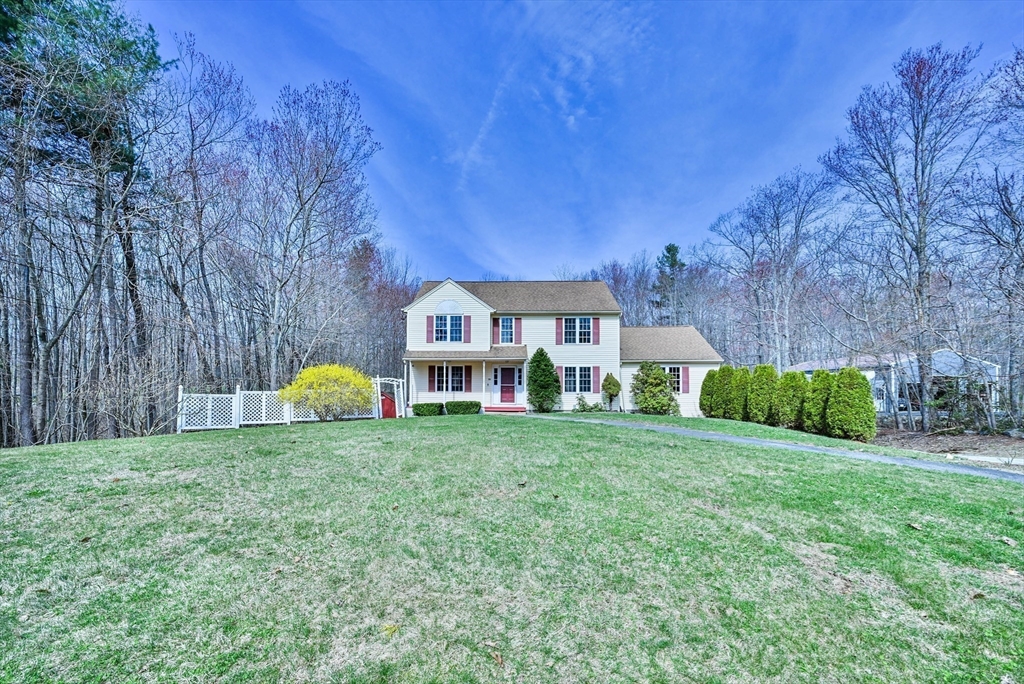 99 Smith Road Charlton, MA 01507 - Photo 3 of 37 a view of a house with a back yard