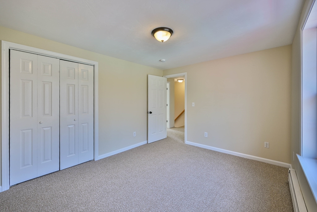 99 Smith Road Charlton, MA 01507 - Photo 35 of 37 a view of an empty room and window
