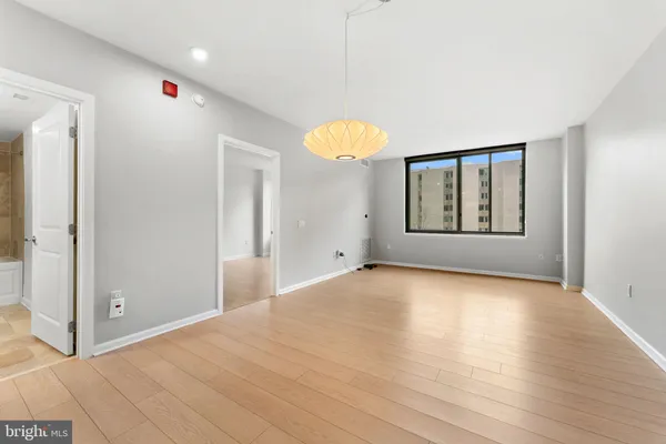 a view of an empty room and window