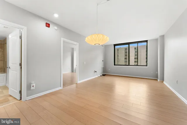 a view of an empty room and window