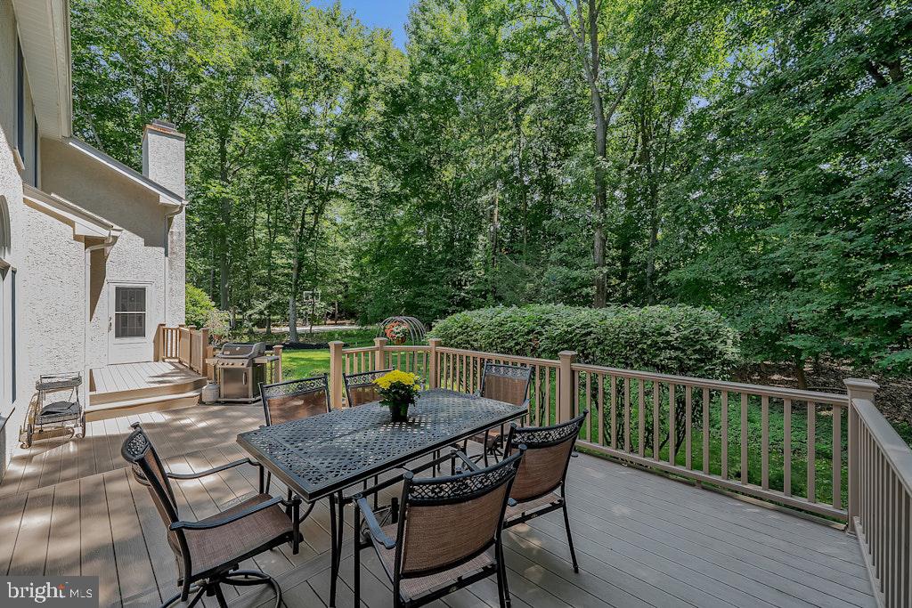 17 Stanwyck Road Mount Laurel, NJ 08054 - Photo 50 of 56 Serene deck nestled in lush greenery.