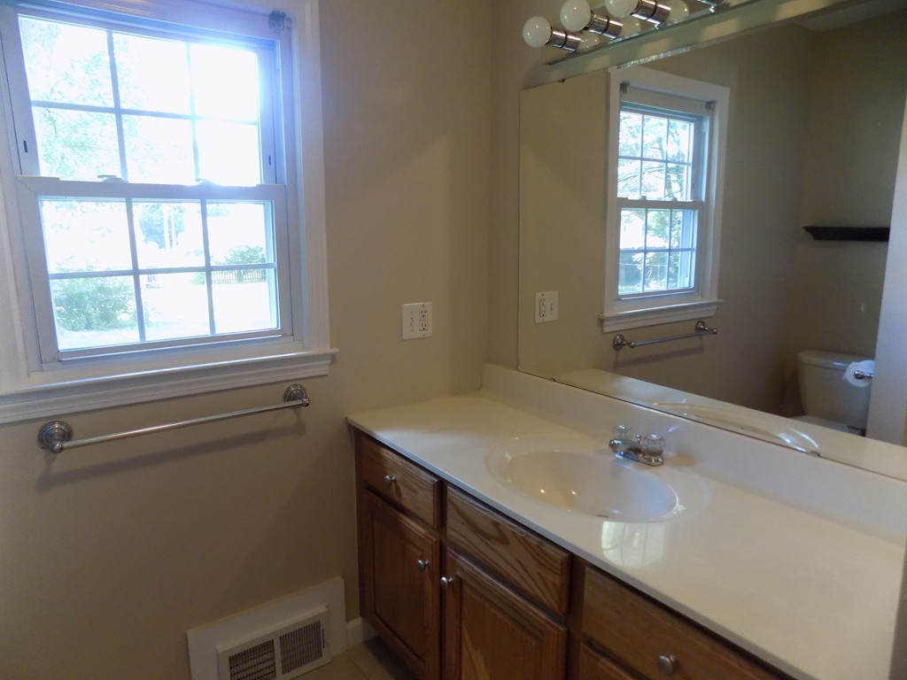 90 Embassy Road Springfield, MA 01119 - Photo 11 of 18 a bathroom with a sink and a window
