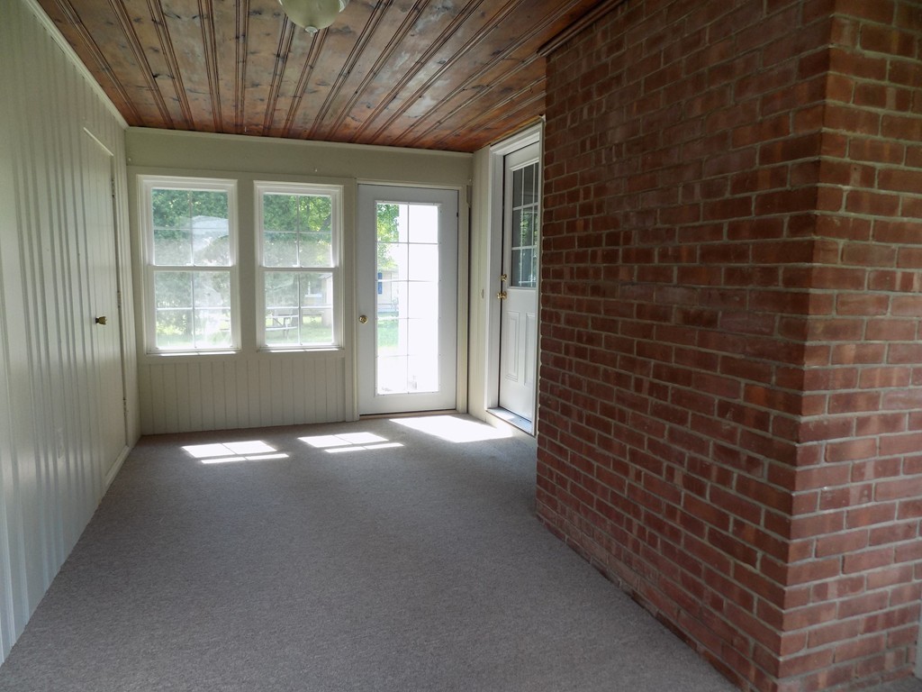 90 Embassy Road Springfield, MA 01119 - Photo 13 of 18 a view of an empty room with a window