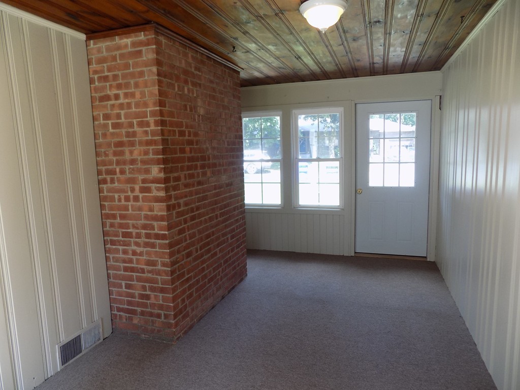 90 Embassy Road Springfield, MA 01119 - Photo 14 of 18 a view of an empty room with a window