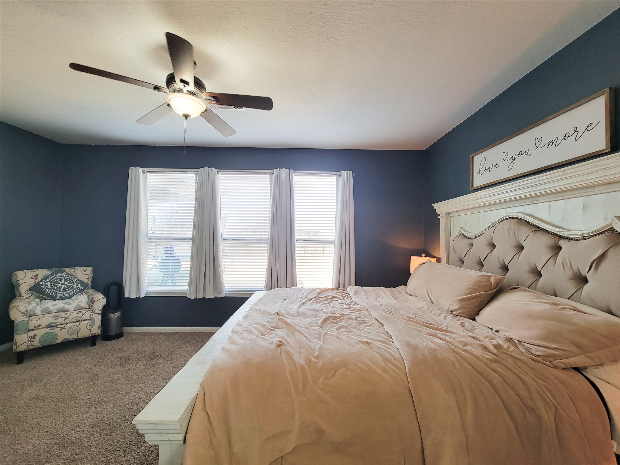 108 Sam Drive Dayton, TX 77535 - Photo 17 of 38 a bedroom with a bed and window