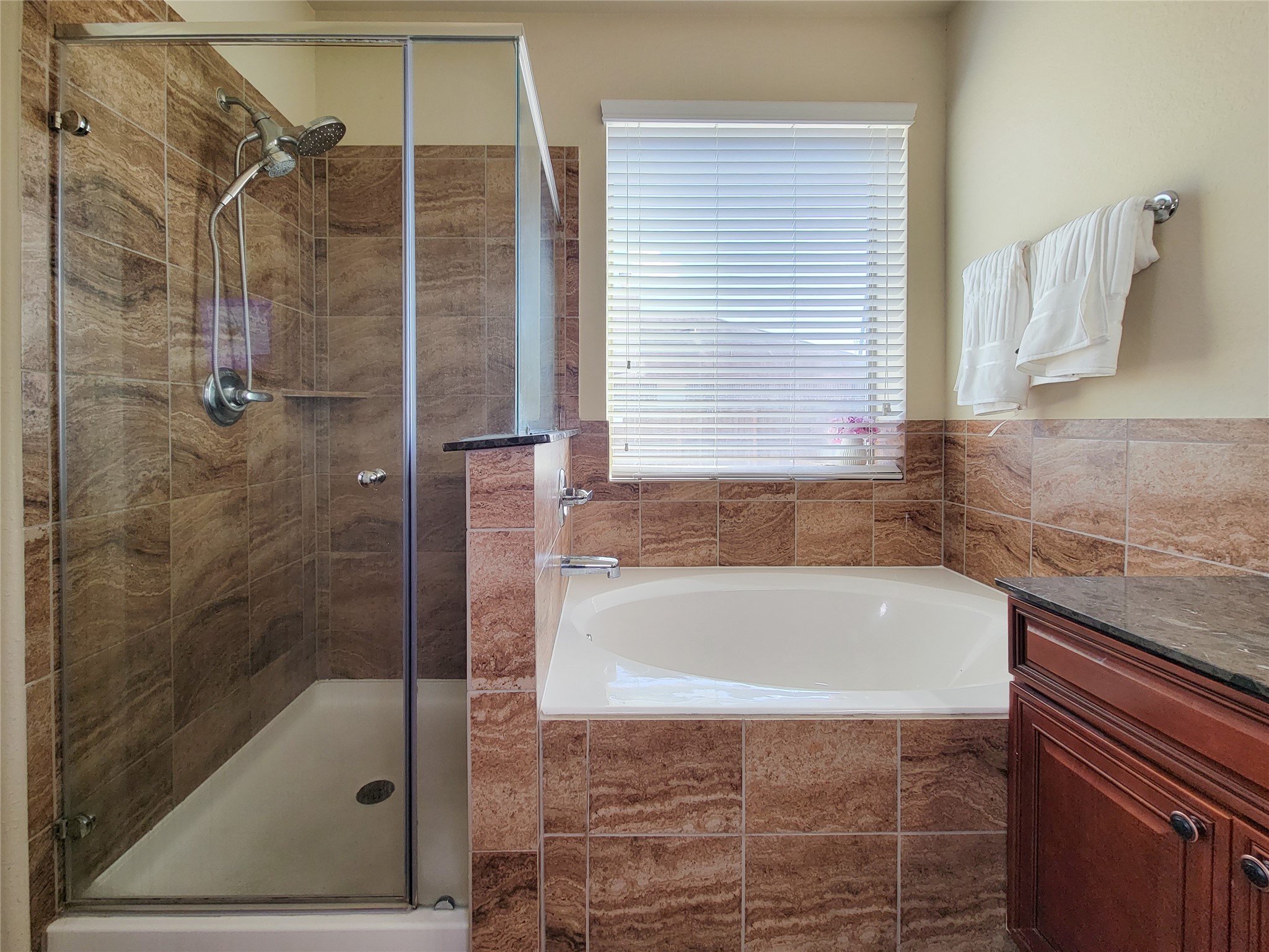108 Sam Drive Dayton, TX 77535 - Photo 20 of 38 a bath tub sitting next to a bathroom sink
