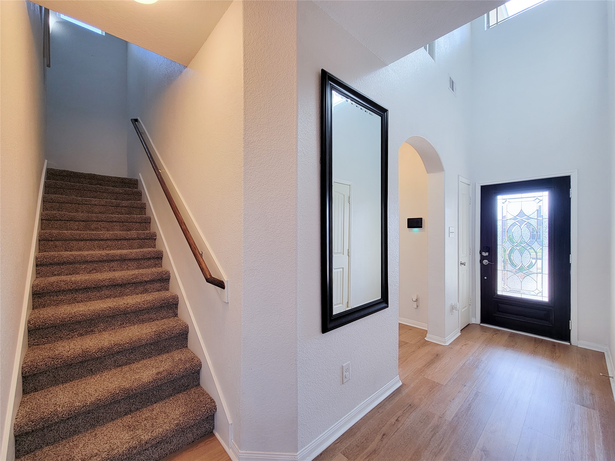 108 Sam Drive Dayton, TX 77535 - Photo 21 of 38 a view of an entryway with wooden floor and door