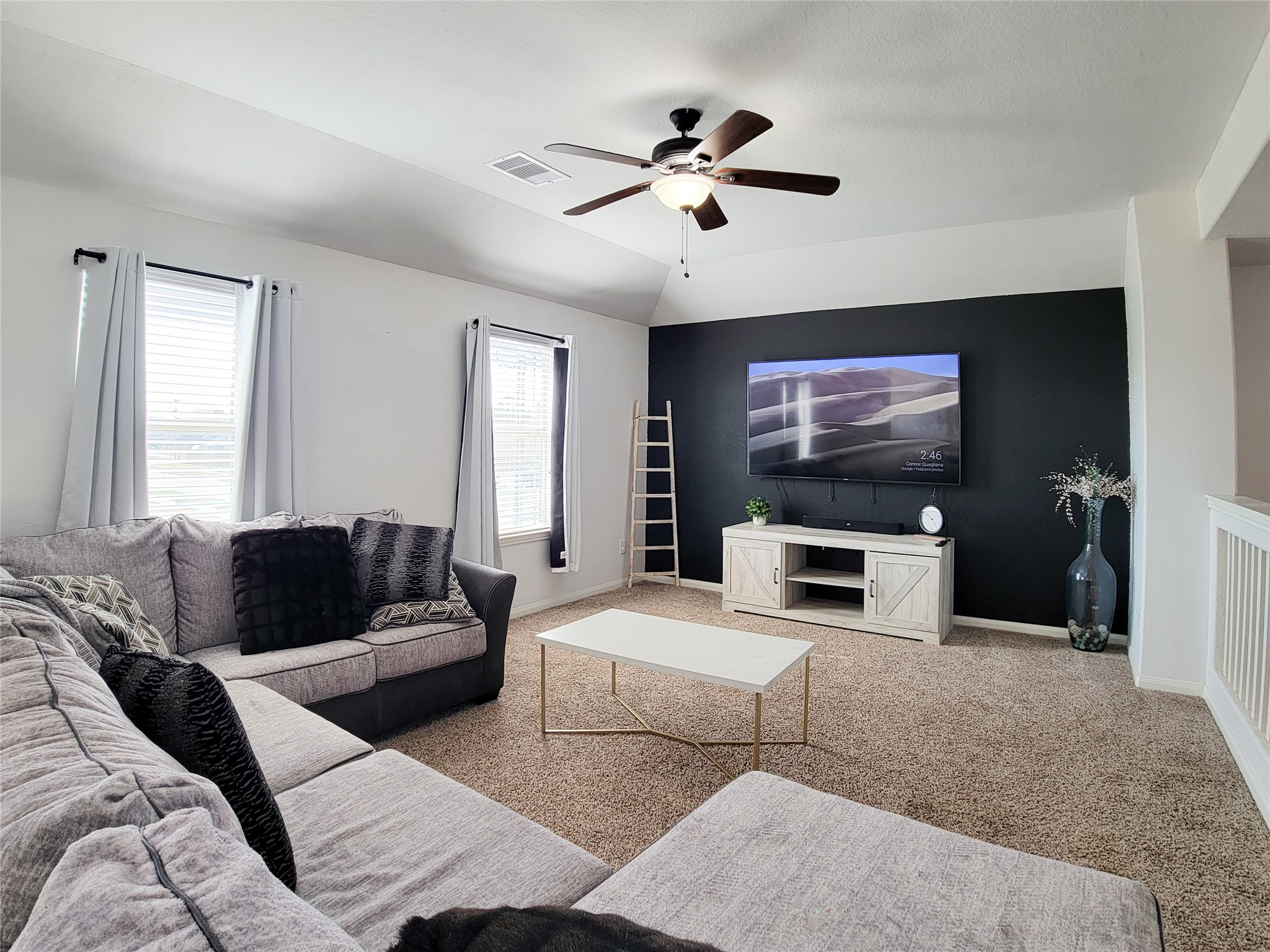 108 Sam Drive Dayton, TX 77535 - Photo 25 of 38 a living room with furniture and a flat screen tv