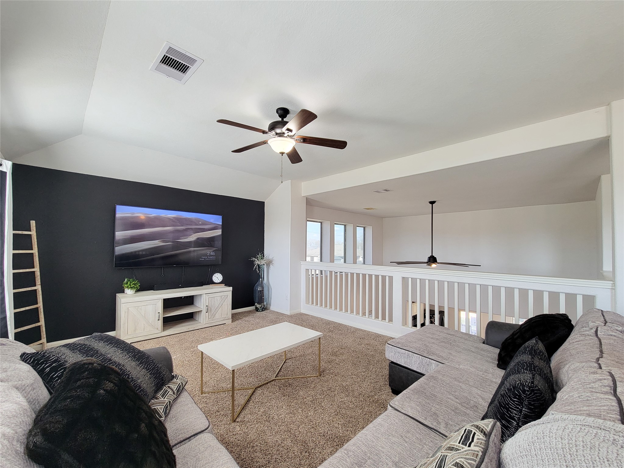 108 Sam Drive Dayton, TX 77535 - Photo 26 of 38 a living room with furniture and a flat screen tv