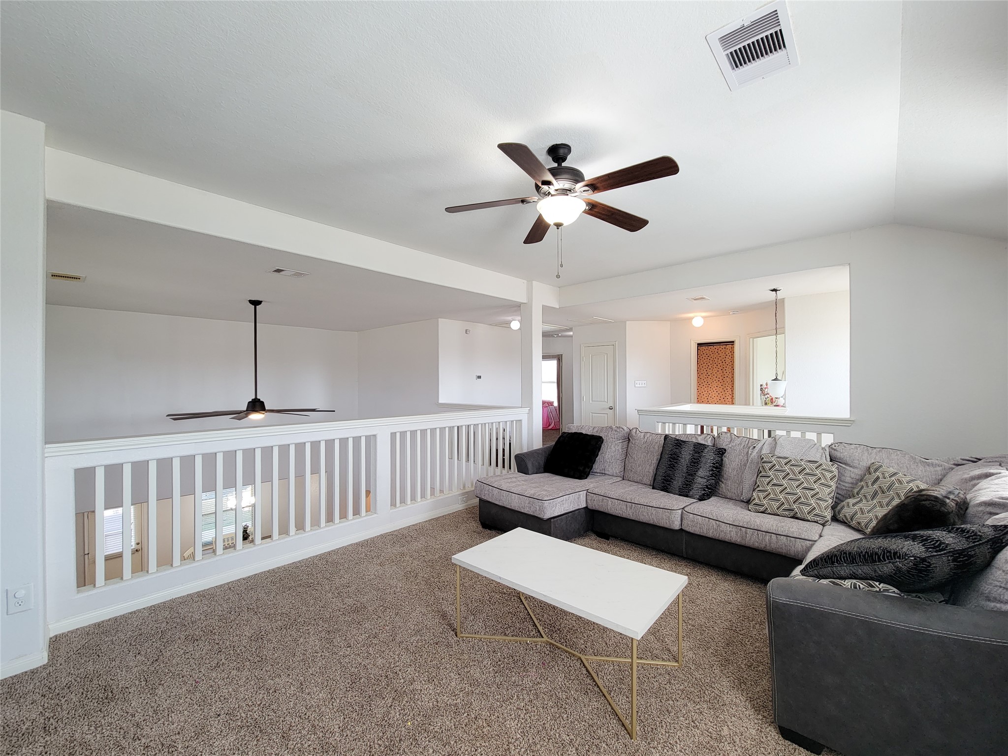 108 Sam Drive Dayton, TX 77535 - Photo 27 of 38 a living room with furniture and a window