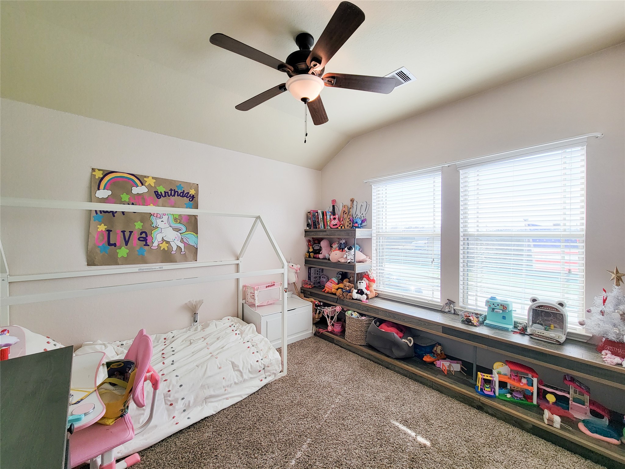 108 Sam Drive Dayton, TX 77535 - Photo 28 of 38 a bed room with furniture and a window