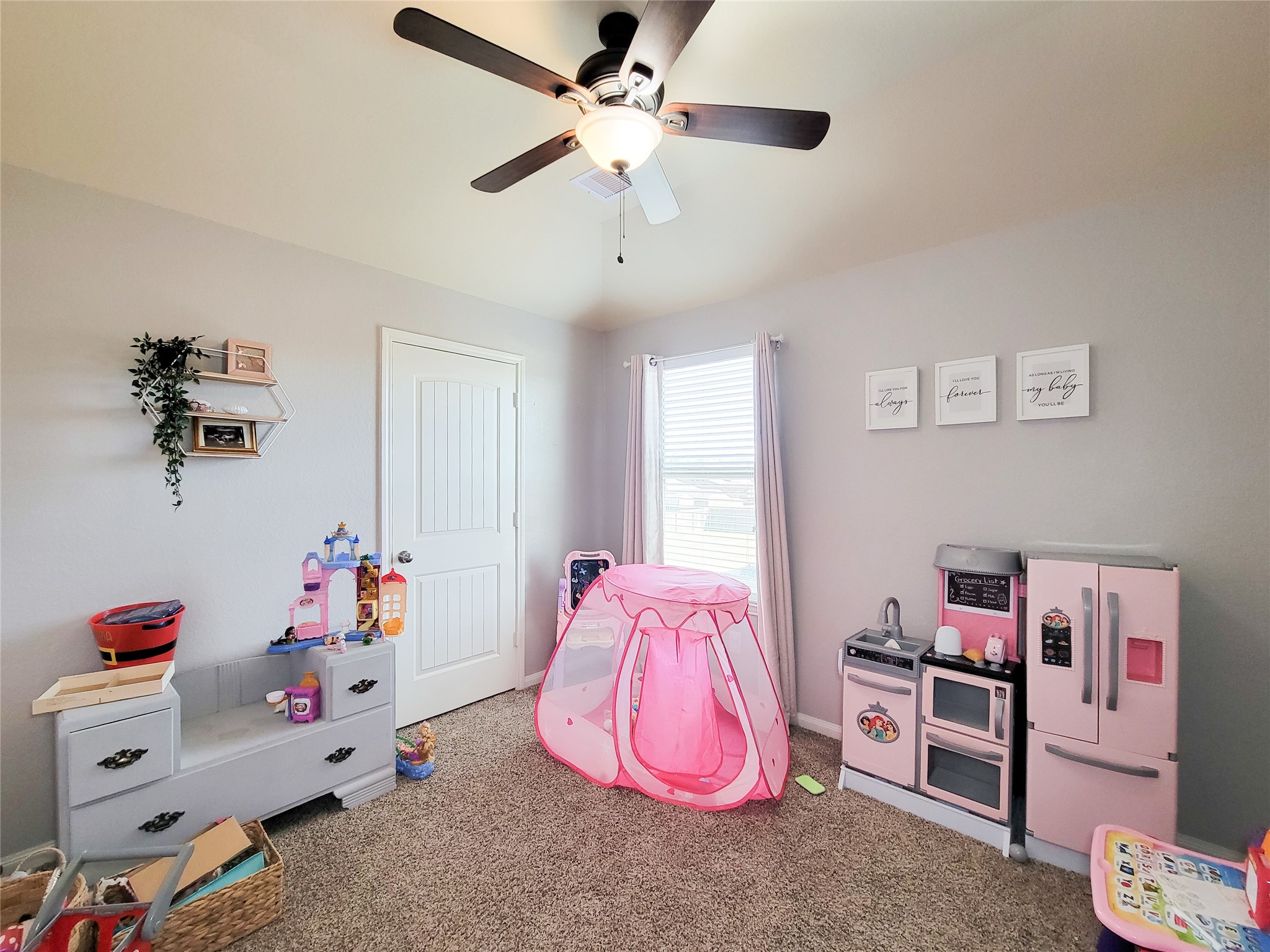 108 Sam Drive Dayton, TX 77535 - Photo 29 of 38 a bedroom with furniture and a window
