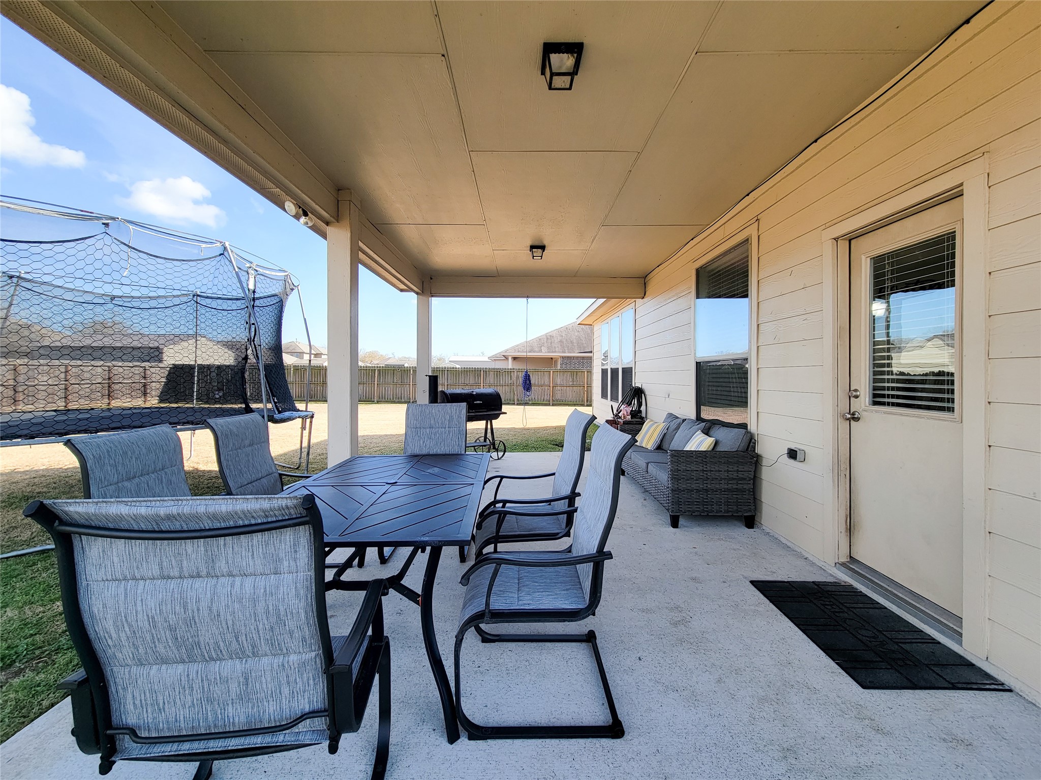 108 Sam Drive Dayton, TX 77535 - Photo 35 of 38 a view of a dining room with furniture window and wooden floor