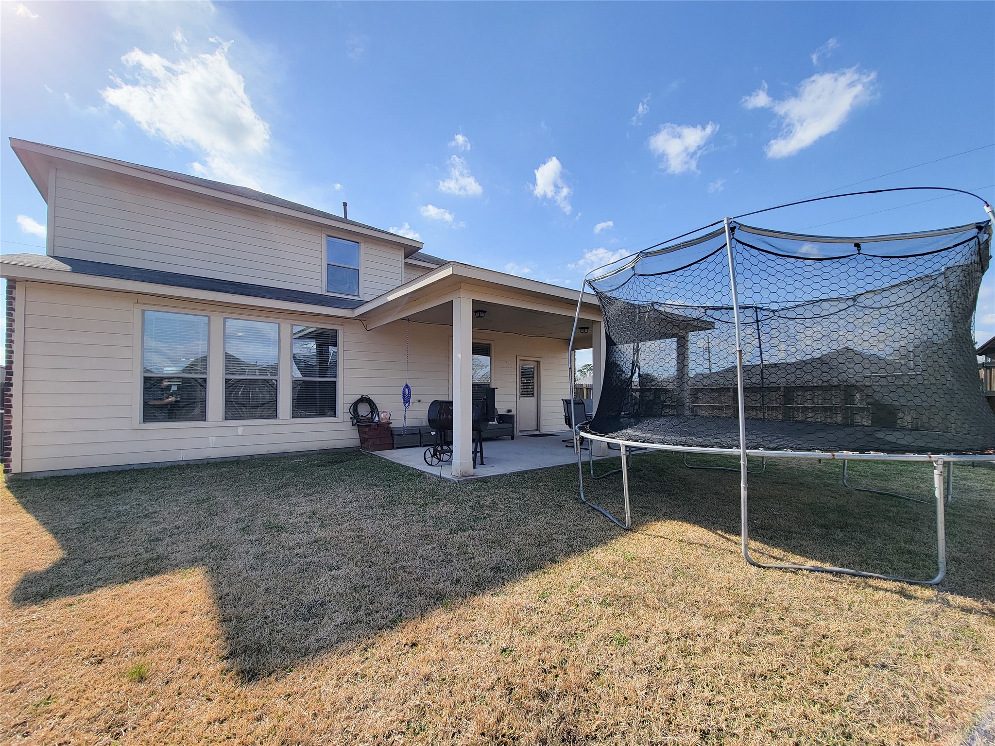 108 Sam Drive Dayton, TX 77535 - Photo 36 of 38 a house view with a backyard space