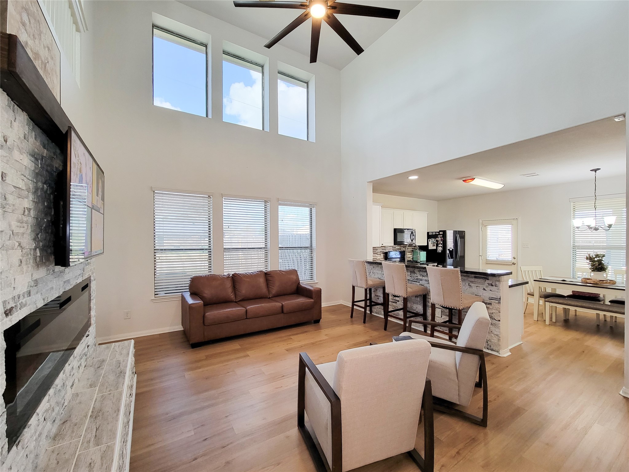 108 Sam Drive Dayton, TX 77535 - Photo 5 of 38 a living room with furniture and a flat screen tv
