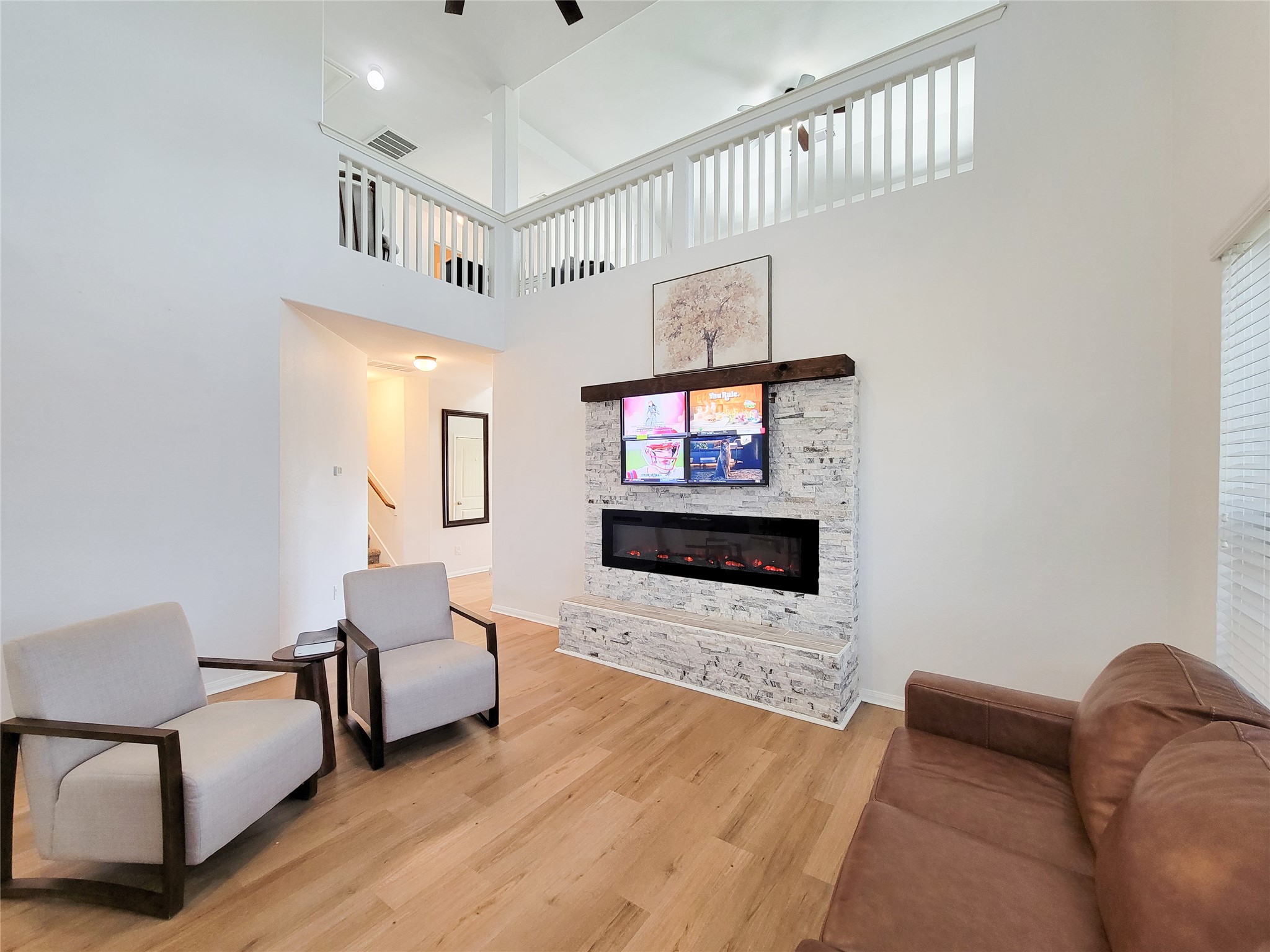 108 Sam Drive Dayton, TX 77535 - Photo 8 of 38 a living room with furniture and a flat screen tv
