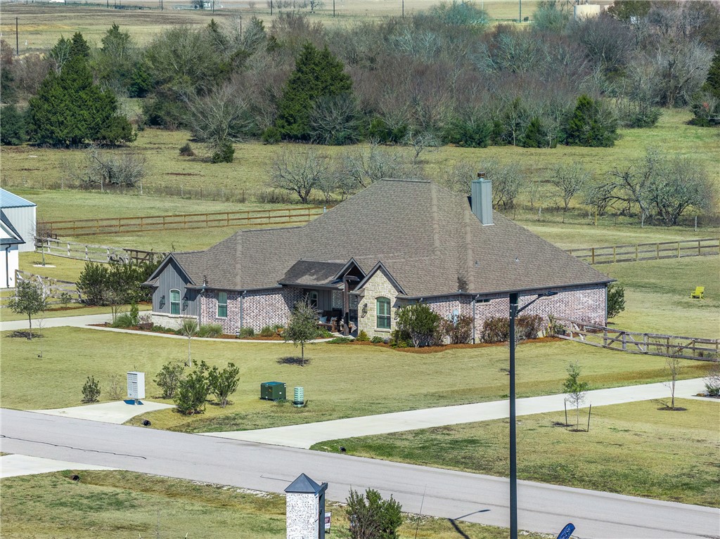 3222 Hunters Crossing Bryan, TX 77808 - Photo 39 of 44 Front aerial view of home.