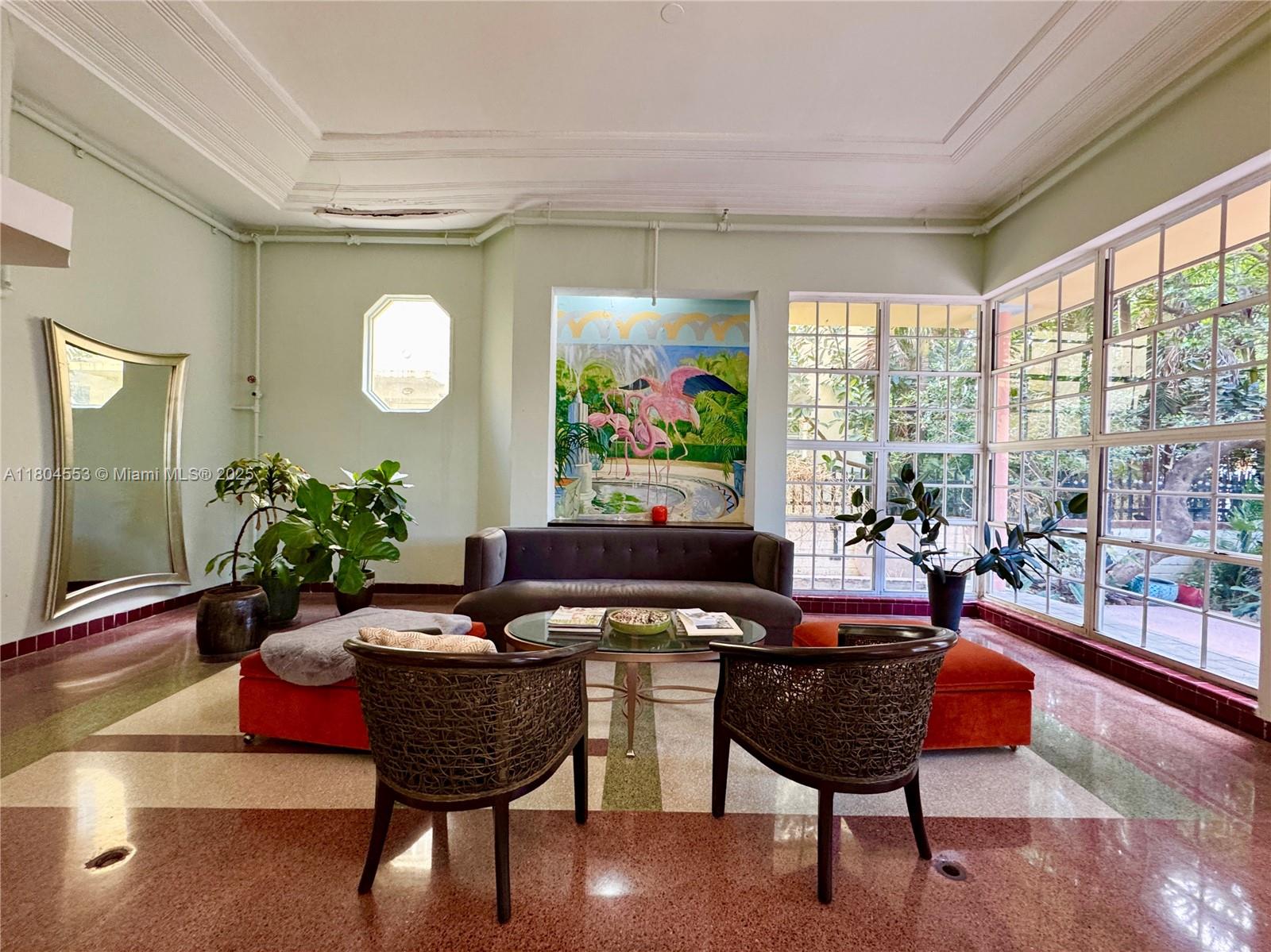 1051 Meridian Avenue, Unit 1D Miami Beach, FL 33139 - Photo 14 of 16 a living room with furniture and a potted plant
