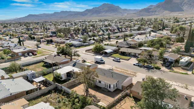 an aerial view of residential houses and outdoor space