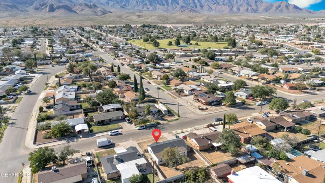 a bathroom with a shower and a sink