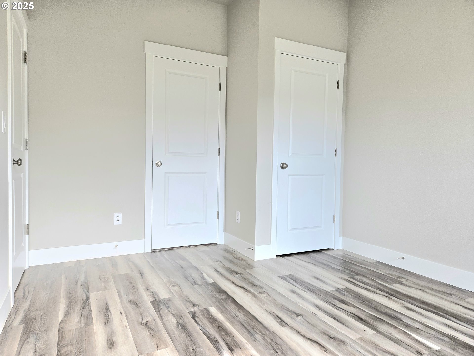 8524 North 1st Street Ridgefield, WA 98642 - Photo 3 of 48 a view of a room with wooden floor