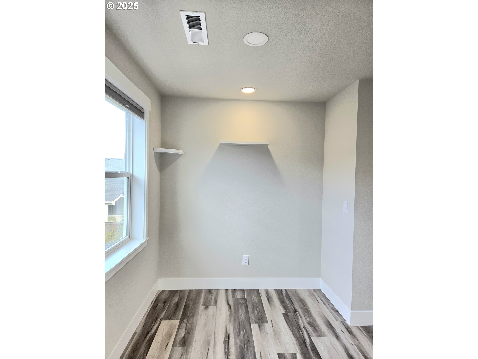 8524 North 1st Street Ridgefield, WA 98642 - Photo 39 of 48 a view of wooden floor in a room