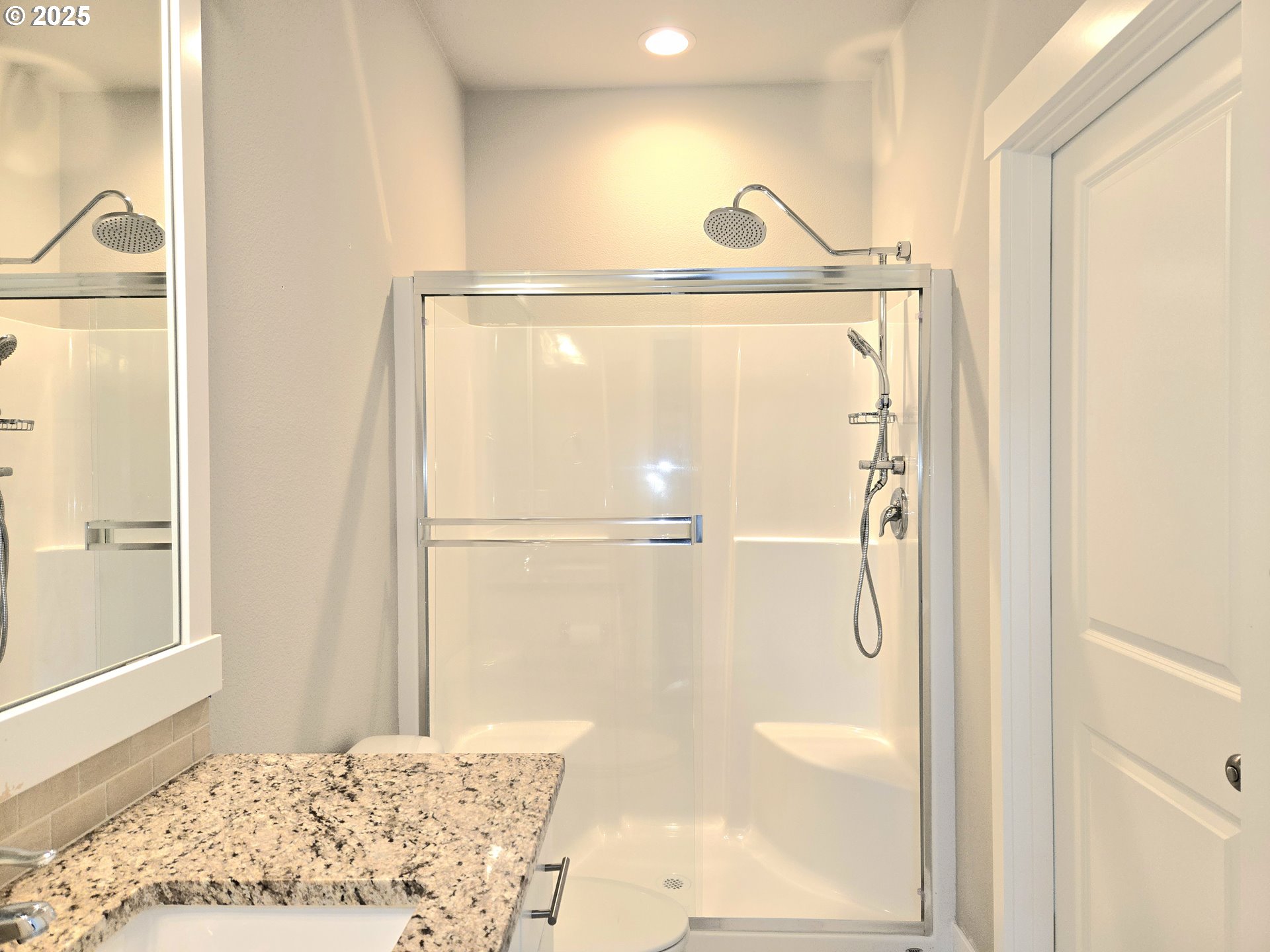 8524 North 1st Street Ridgefield, WA 98642 - Photo 6 of 48 a bathroom with a window and a shower