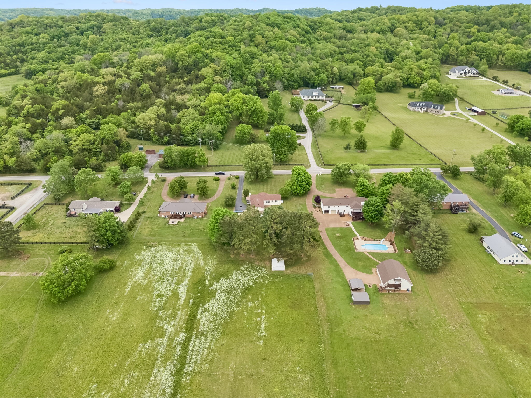 1519 Coleman Road Franklin, TN 37064 - Photo 4 of 9 an aerial view of residential houses with outdoor space and trees