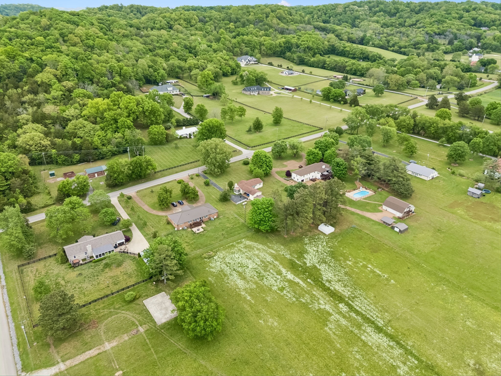 1519 Coleman Road Franklin, TN 37064 - Photo 5 of 9 an aerial view of residential houses with outdoor space and trees