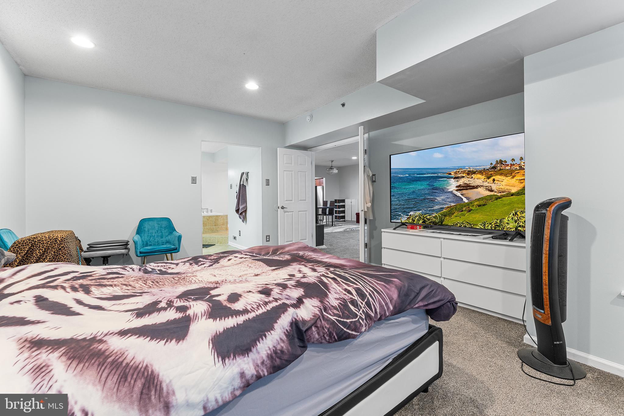 6070 Main Street Voorhees, NJ 08043 - Photo 12 of 22 a bedroom with a bed and a flat screen tv