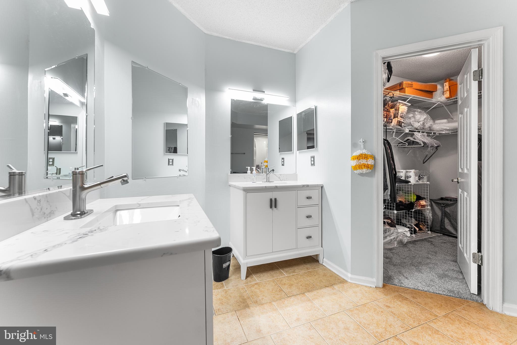 6070 Main Street Voorhees, NJ 08043 - Photo 14 of 22 a view of bathroom sink and mirror
